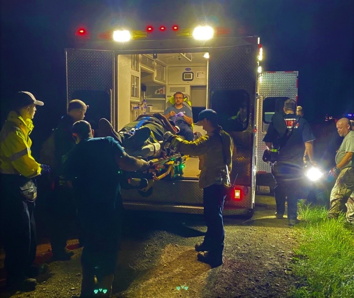 loading subject into ambulance